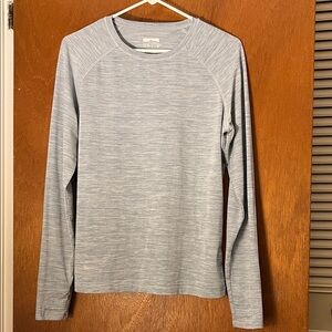 Orvis Women's Heather Light blue Performance Crewneck long sleeved thumb holes.